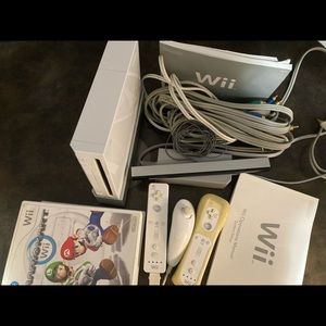 WII used console and 6 games EVERYTHING included to play right away
